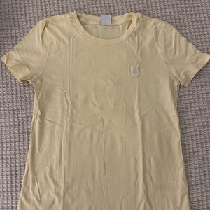 Aritzia TNA yellow baby tee